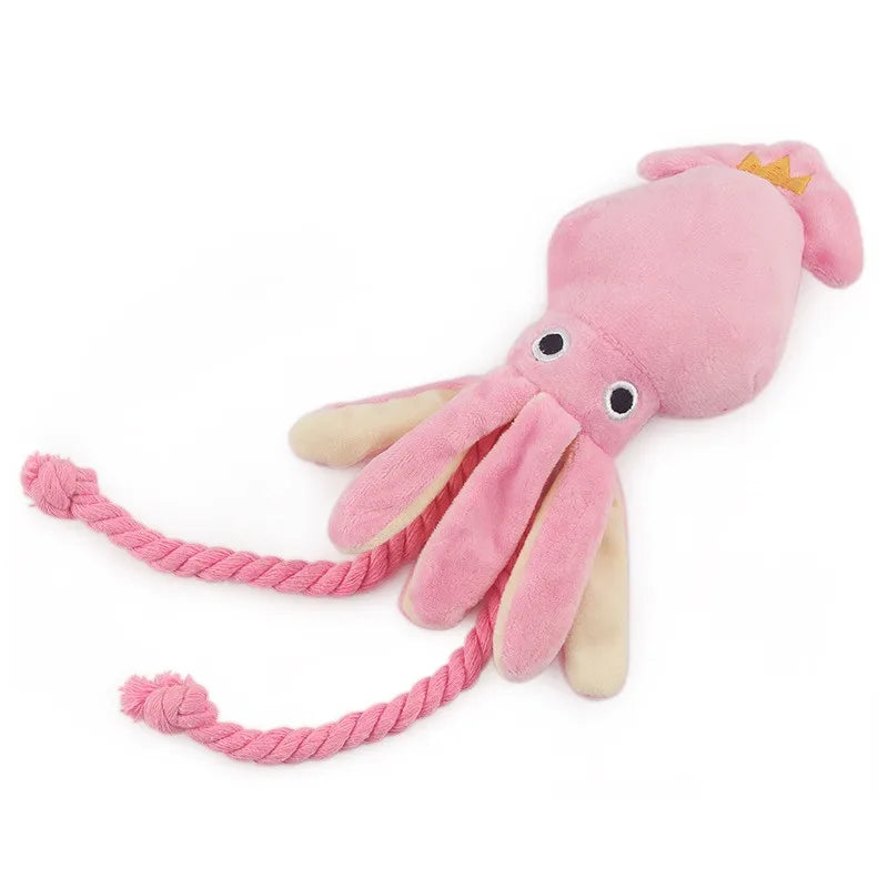 Soft pink and cream plush octopus dog toy with durable twisted rope legs, designed for interactive tugging and chewing play