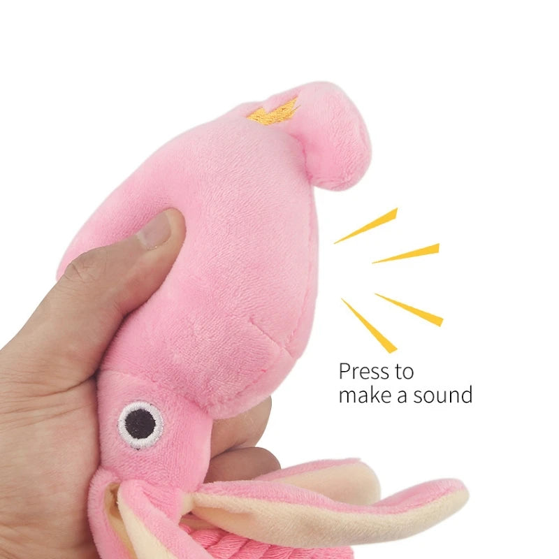 Soft pink and cream plush octopus dog toy with durable twisted rope legs, designed for interactive tugging and chewing play
