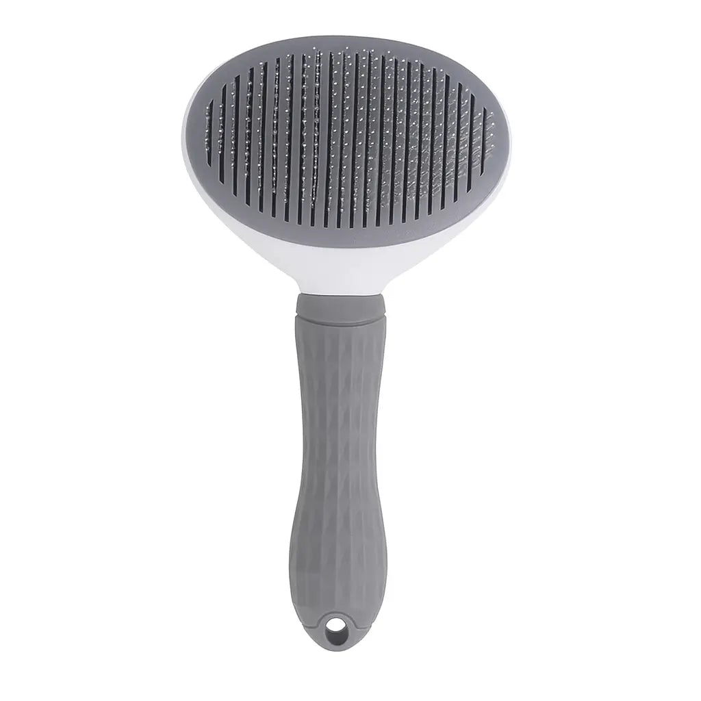 Grey pet grooming brush with a textured handle and oval brush head featuring closely spaced metal bristles