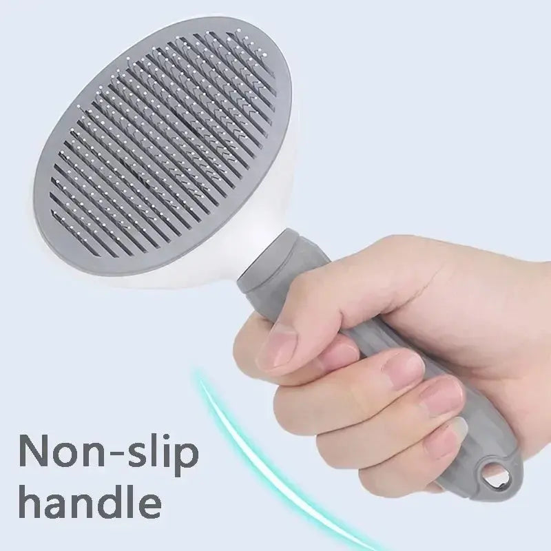 pet grooming brush with a textured handle and oval brush head featuring closely spaced metal bristles