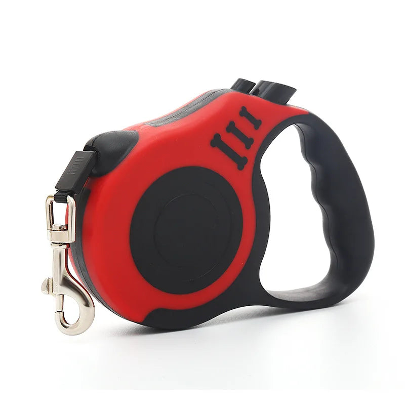 Red and black retractable dog leash with ergonomic handle and metal clip for attaching to a collar or harness