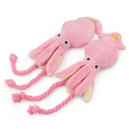 Soft pink and cream plush octopus dog toy with durable twisted rope legs, designed for interactive tugging and chewing play
