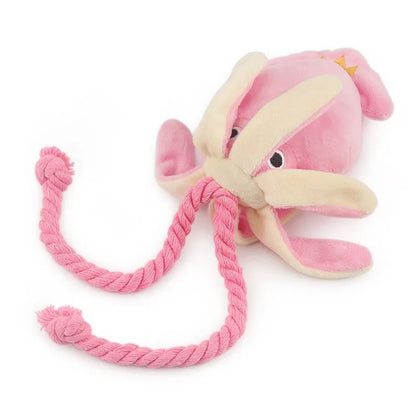 Soft pink and cream plush octopus dog toy with durable twisted rope legs, designed for interactive tugging and chewing play
