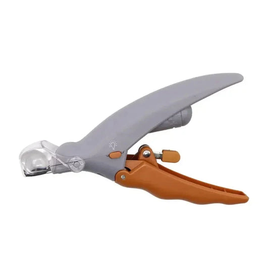 Pet nail clipper with ergonomic handle and built-in LED light for safe and precise trimming, featuring a safety guard and transparent protective cover