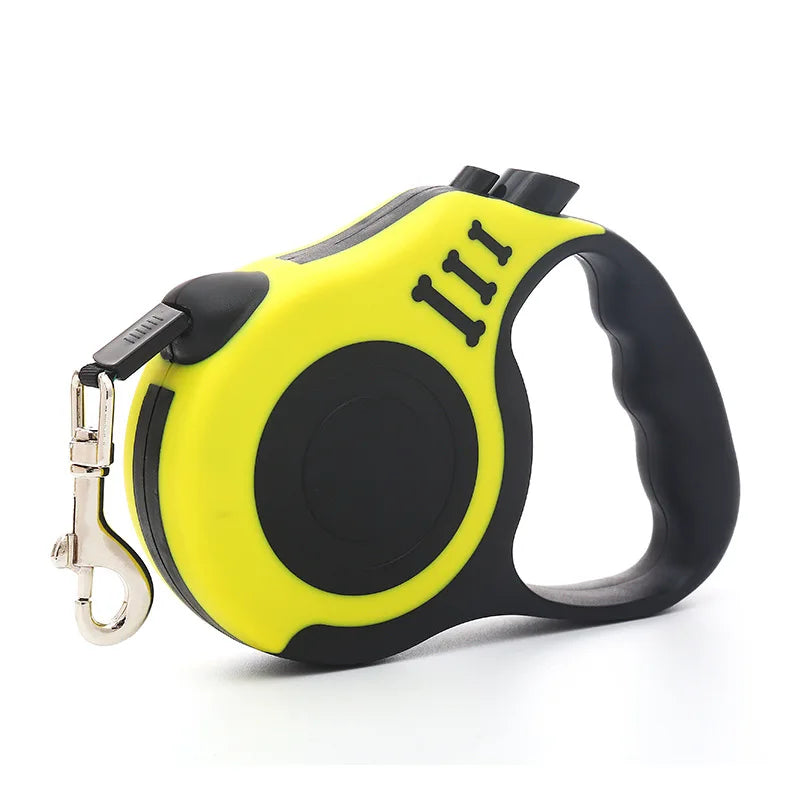 Yellow and black retractable dog leash with ergonomic handle and metal clip for attaching to a collar or harness